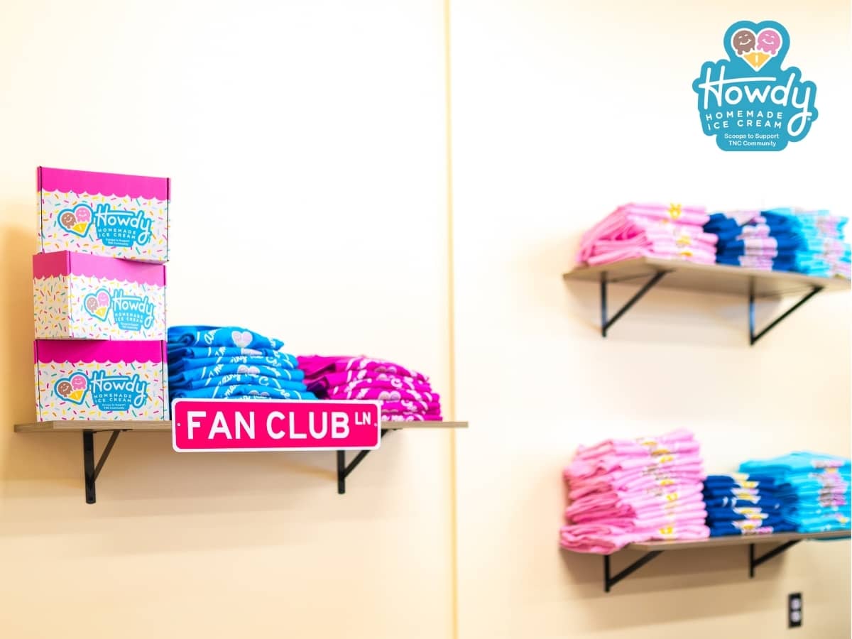 Howdy Homemade Ice Cream Fan Club T-shirts and swag boxes on display in the shop