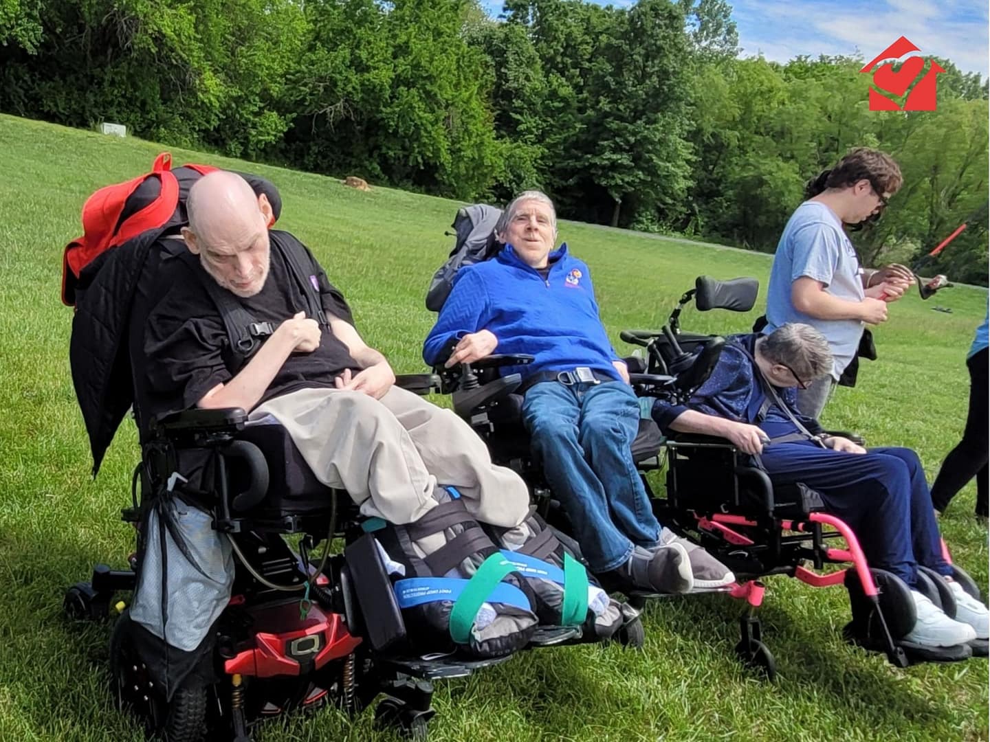 A group of our residential living gentlemen outside enjoying the Spring Fun Day