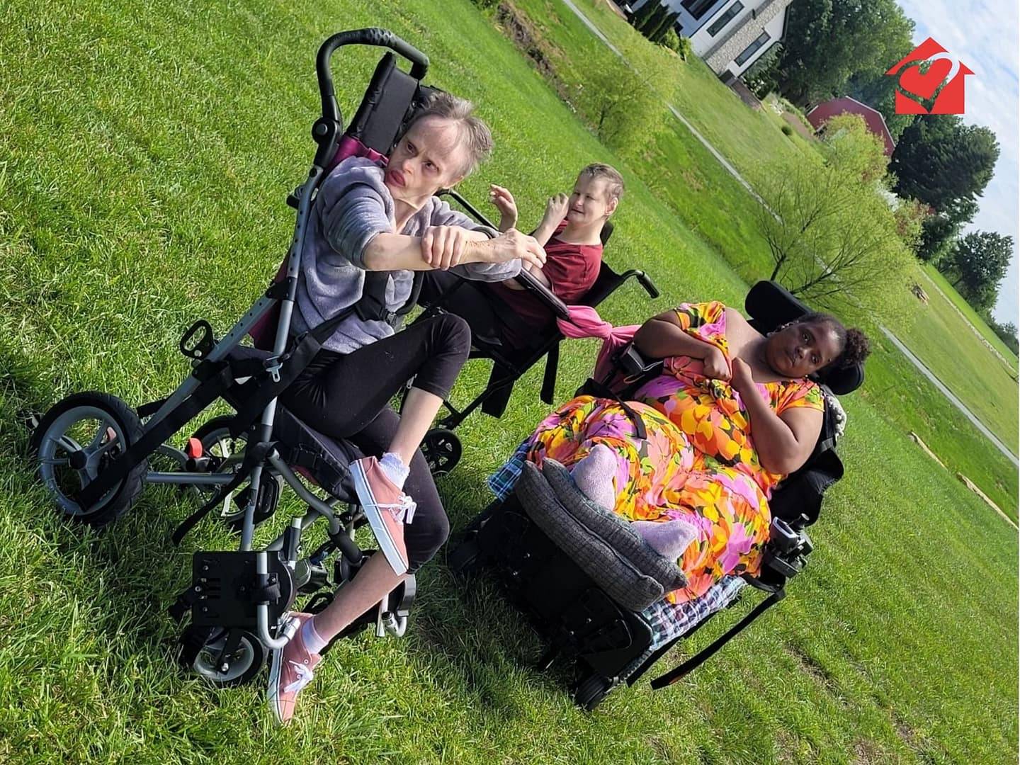 A group of our residential living ladies outside enjoying the Spring Fun Day