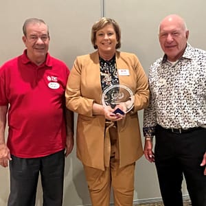 CEO Kelly McGillis (center) with Board Chair Doug Hall (right) and Board Vice Chair Jerry Cornell